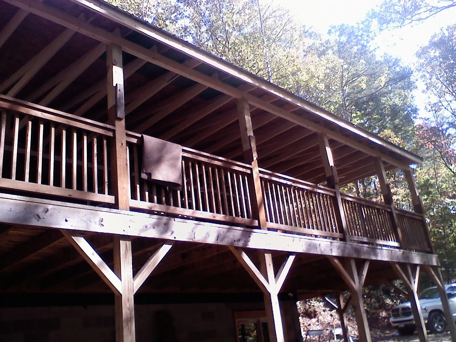 Timber framing under a new elevated porch and deck — Roof Leak Repair in Nottawa by Roofing Brothers